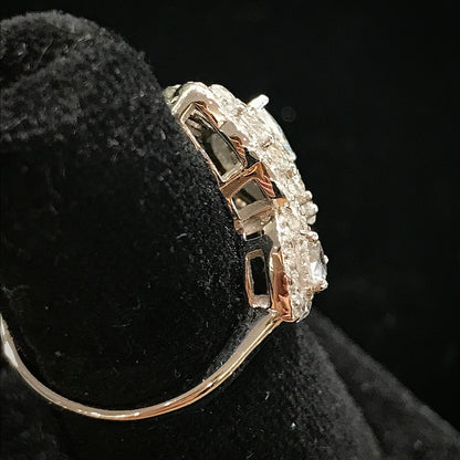 A sterling silver ring set with marquise cut white sapphire stones in sterling silver.