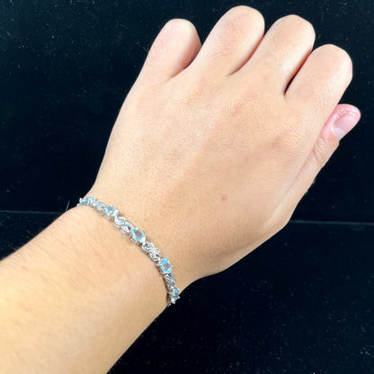 Blue Topaz Infinity Bracelet | Sterling Silver