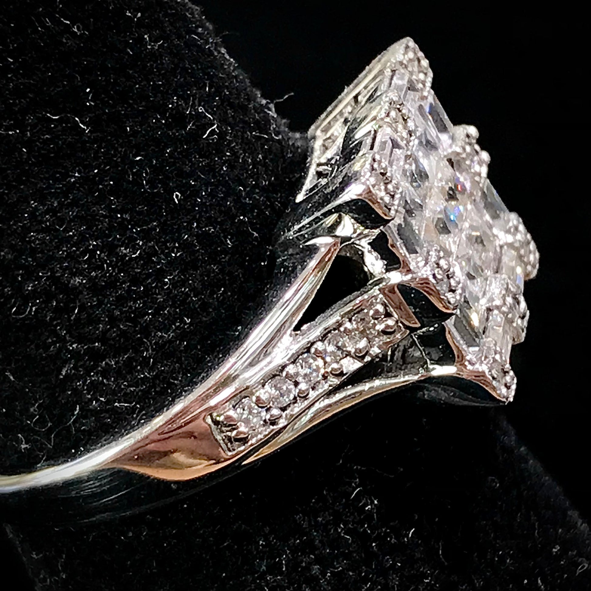 Square cubic zirconia ring set in sterling silver.