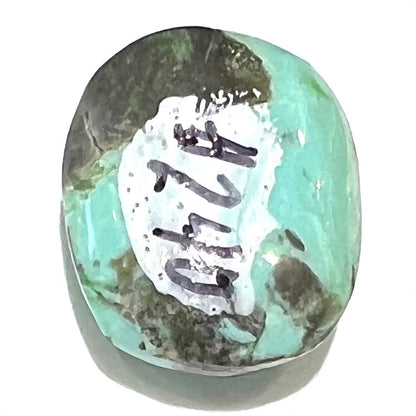 Loose cabochon cut Sleeping Beauty turquoise stone.