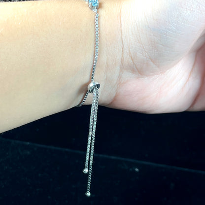 Blue Topaz Infinity Bracelet | Sterling Silver