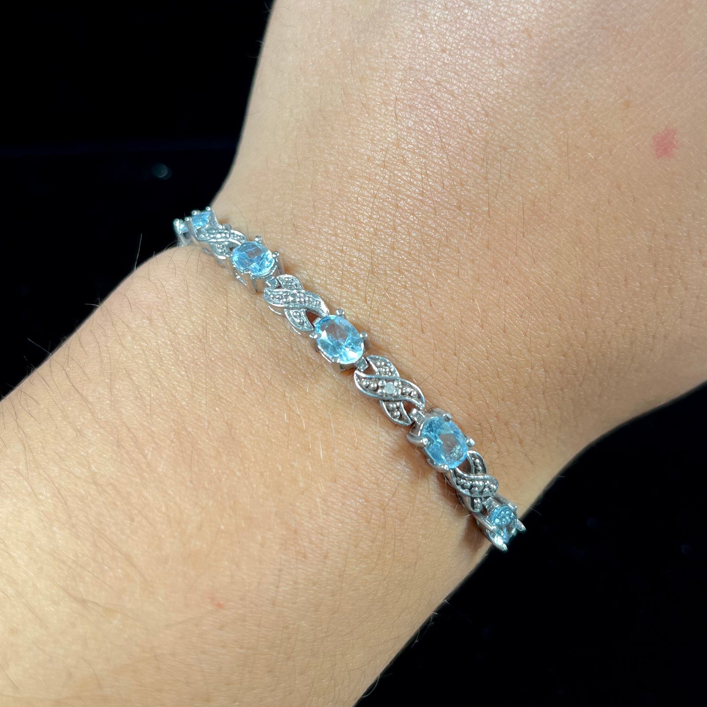 Blue Topaz Infinity Bracelet | Sterling Silver