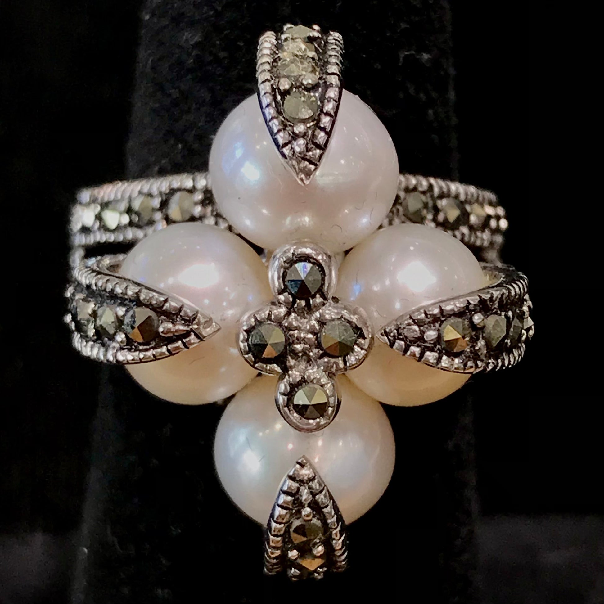Pearl and marcasite ring set in sterling silver.