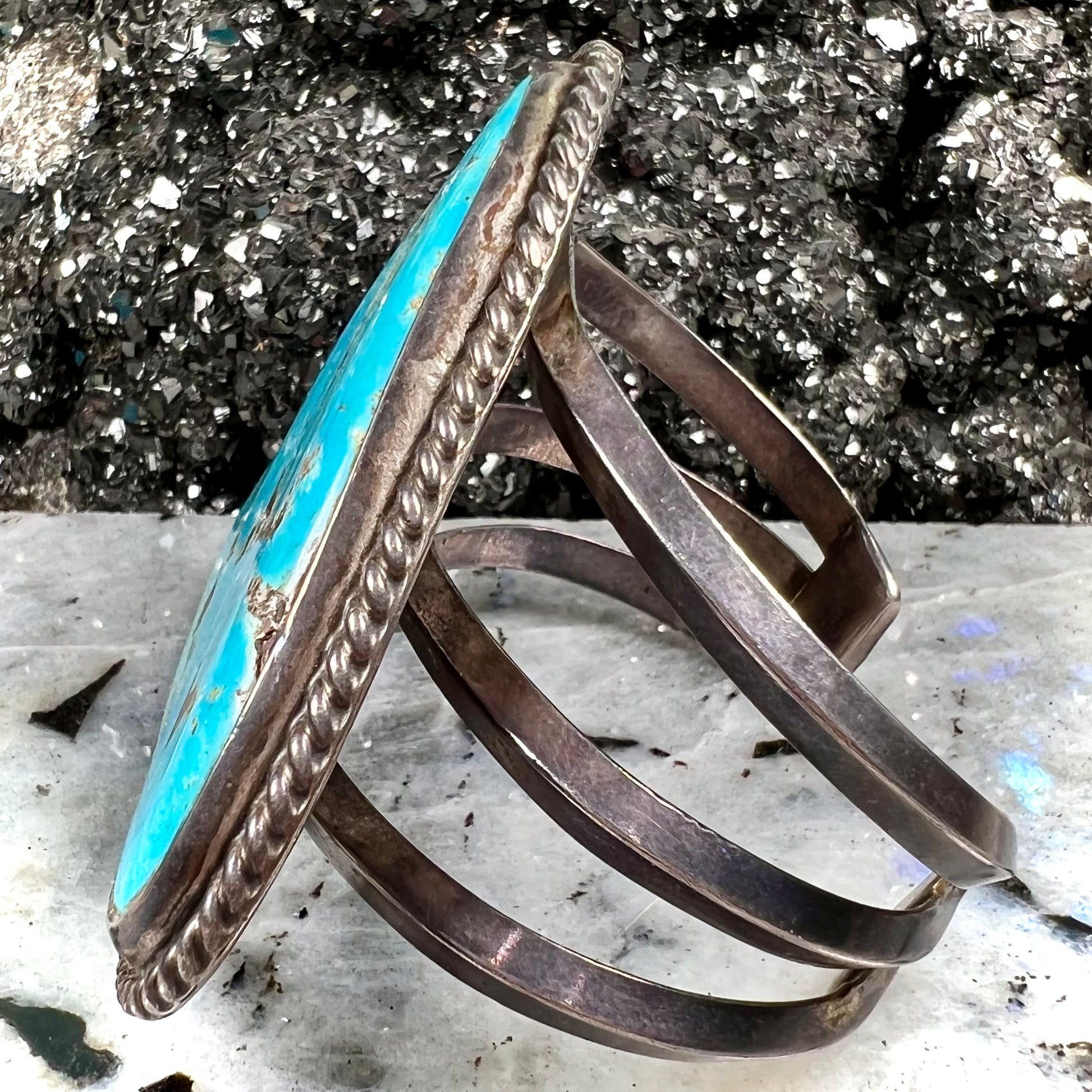 A sterling silver Morenci turquoise cuff bracelet.  The turquoise is large and has orange copper veins.