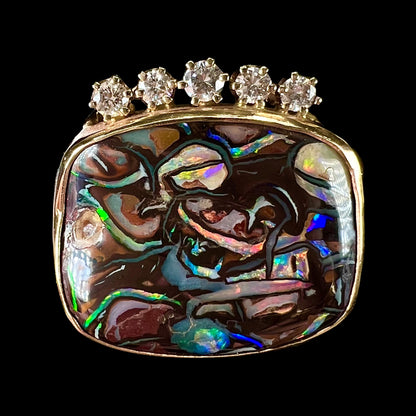 A ladies' yellow gold Koroit boulder opal and diamond slider pendant.