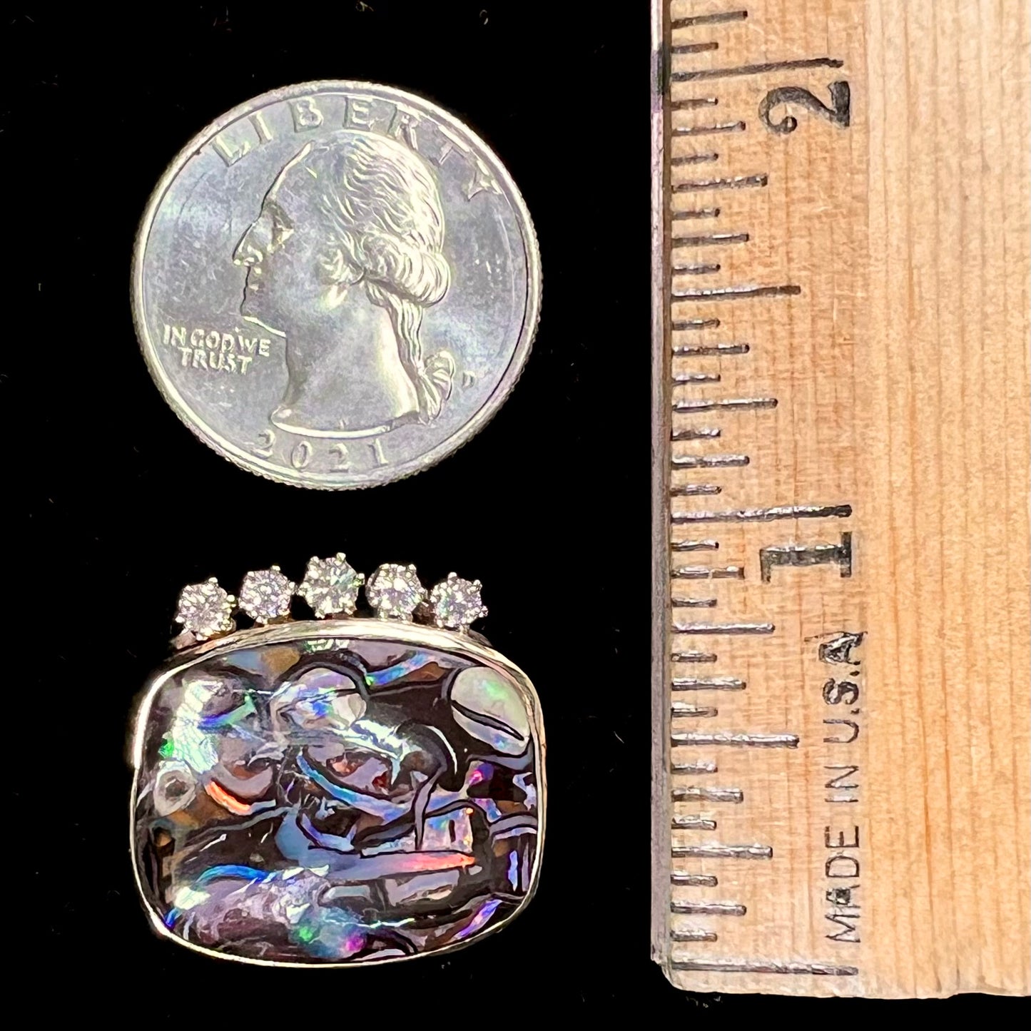 A ladies' yellow gold Koroit boulder opal and diamond slider pendant.