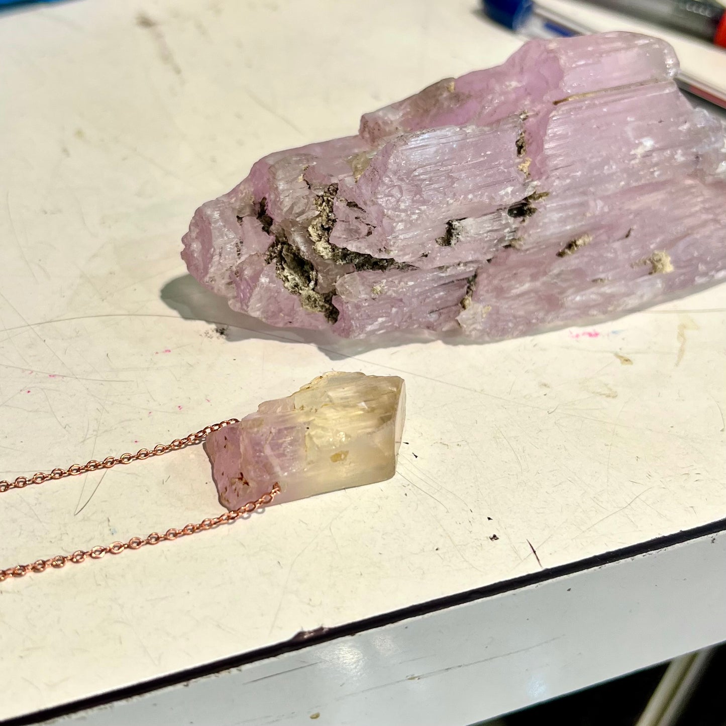 A five inch long pink kunzite crystal.  The crystal is purple when viewed down the ends.