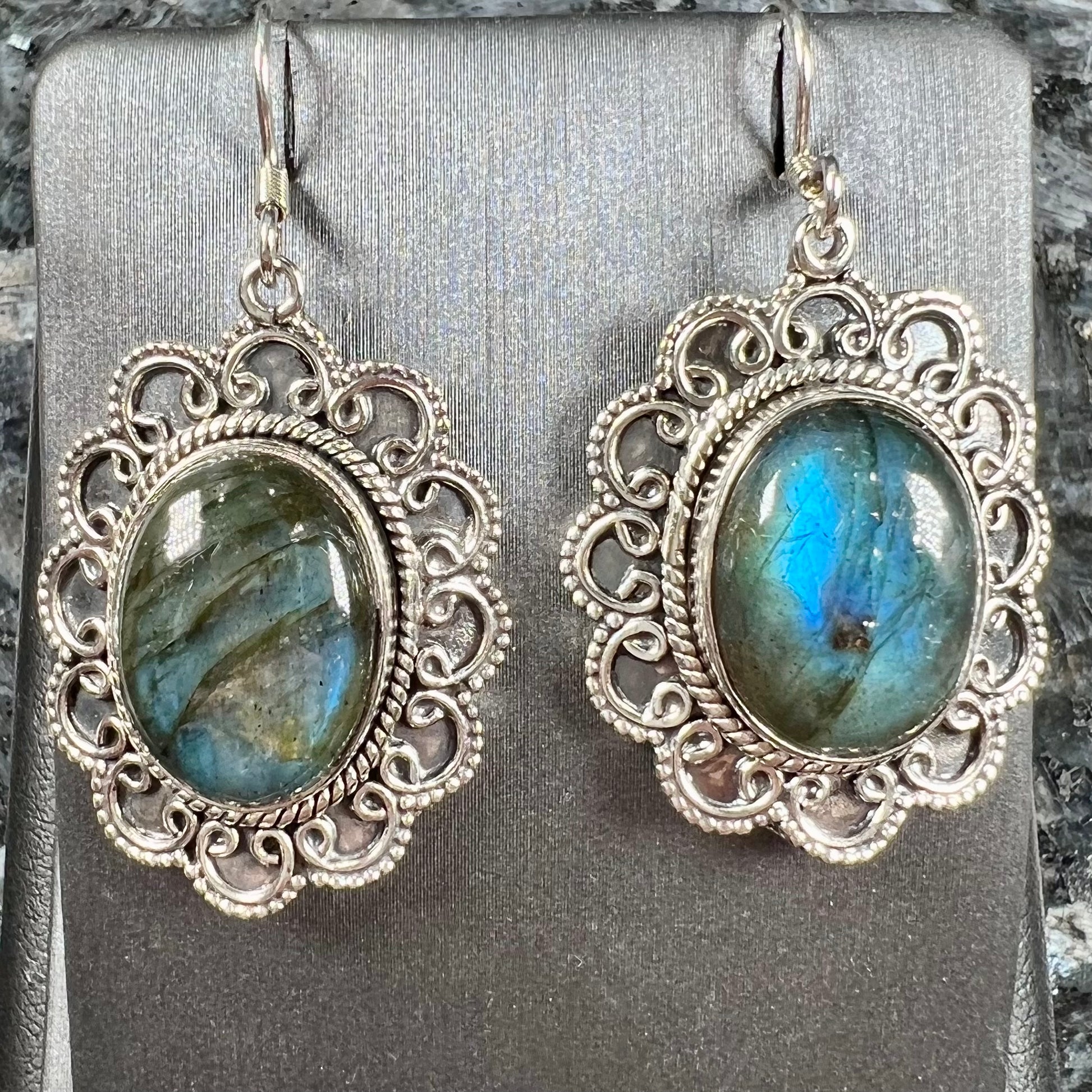 A pair of Southwest style sterling silver labradorite dangle earrings.