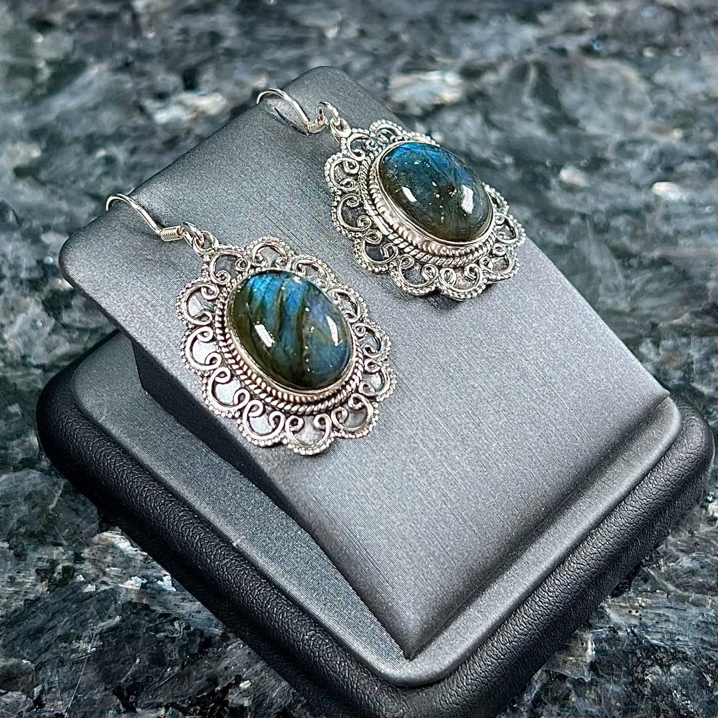 A pair of Southwest style sterling silver labradorite dangle earrings.