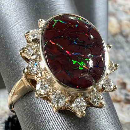 A ladies' diamond halo and Koroit boulder opal engagement ring.