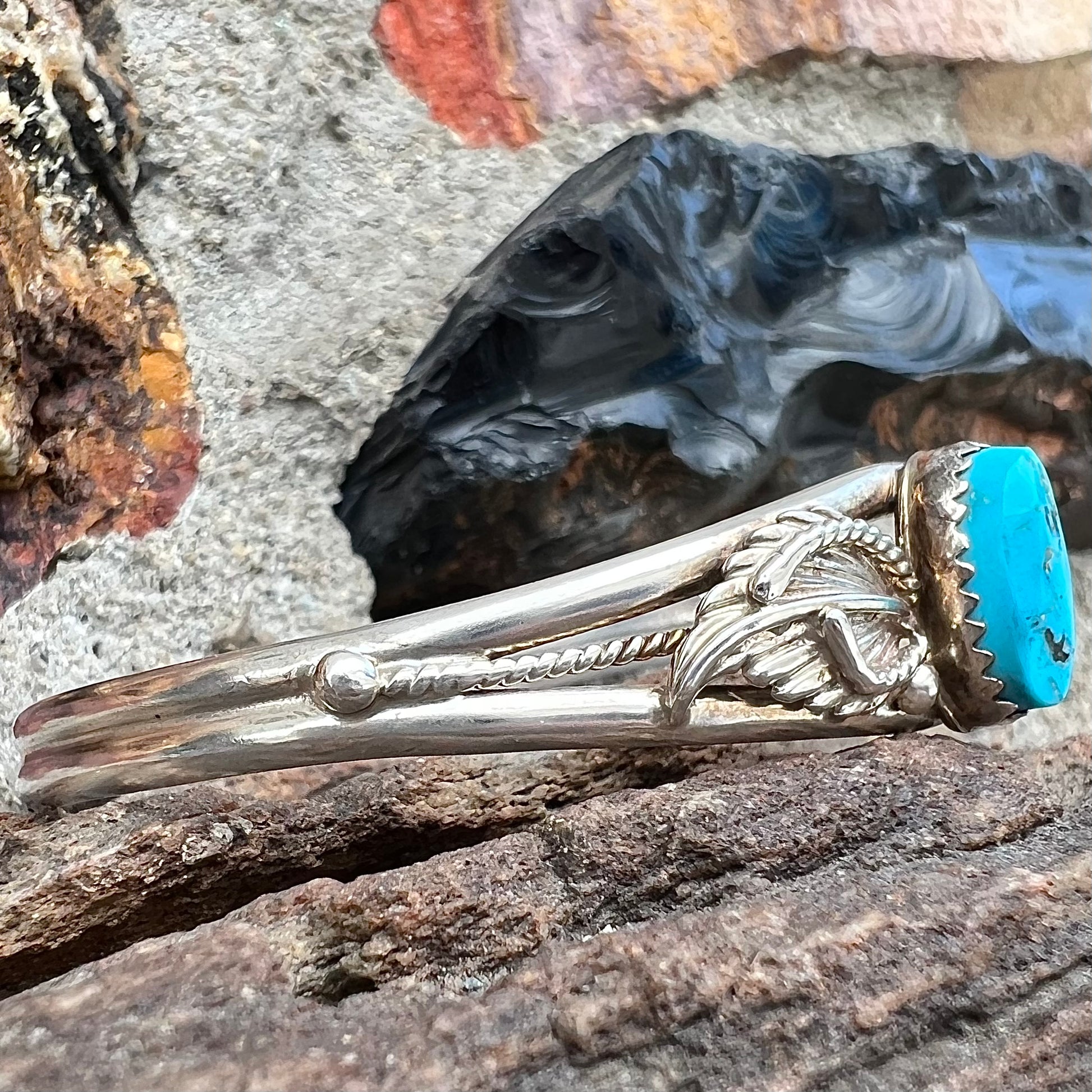 A ladies' sterling silver turquoise cuff bracelet.