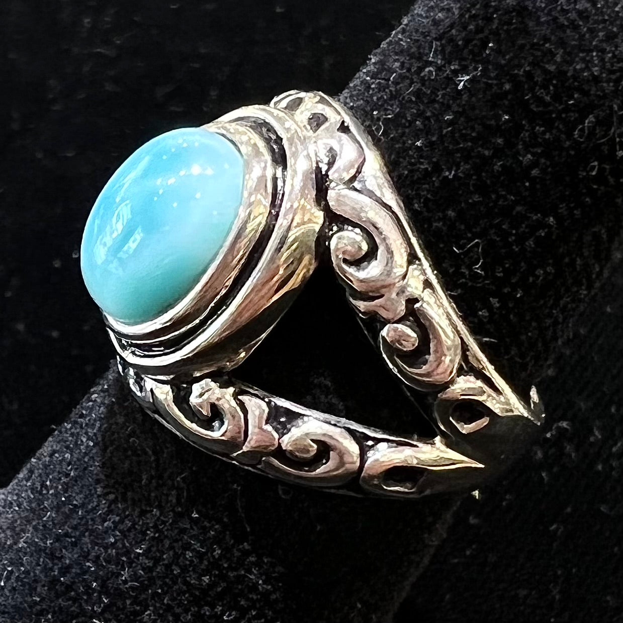 Sterling silver ring with black antiqued highlights set with blue larimar stone.