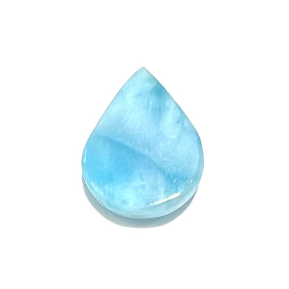 A cabochon cut, pear shaped, natural larimar stone from Dominican Republic.