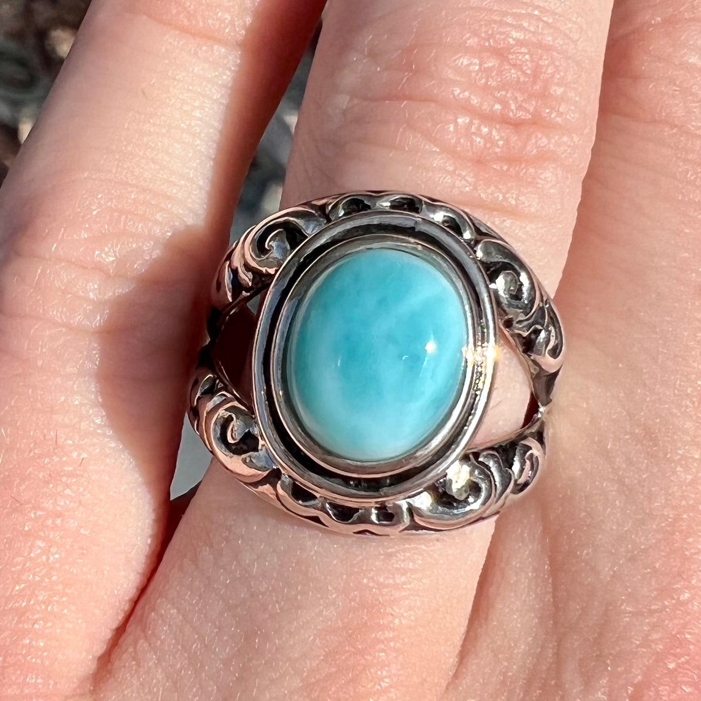 Sterling silver ring with black antiqued highlights set with blue larimar stone.