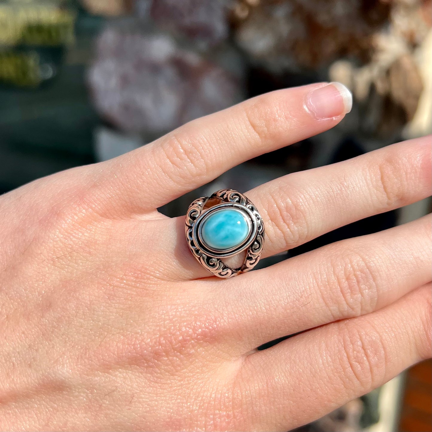 Sterling silver ring with black antiqued highlights set with blue larimar stone.