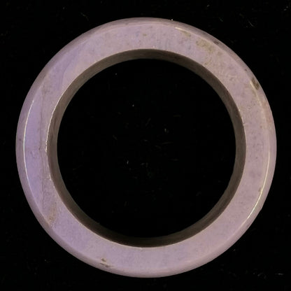 A carved lavender jade stone band.