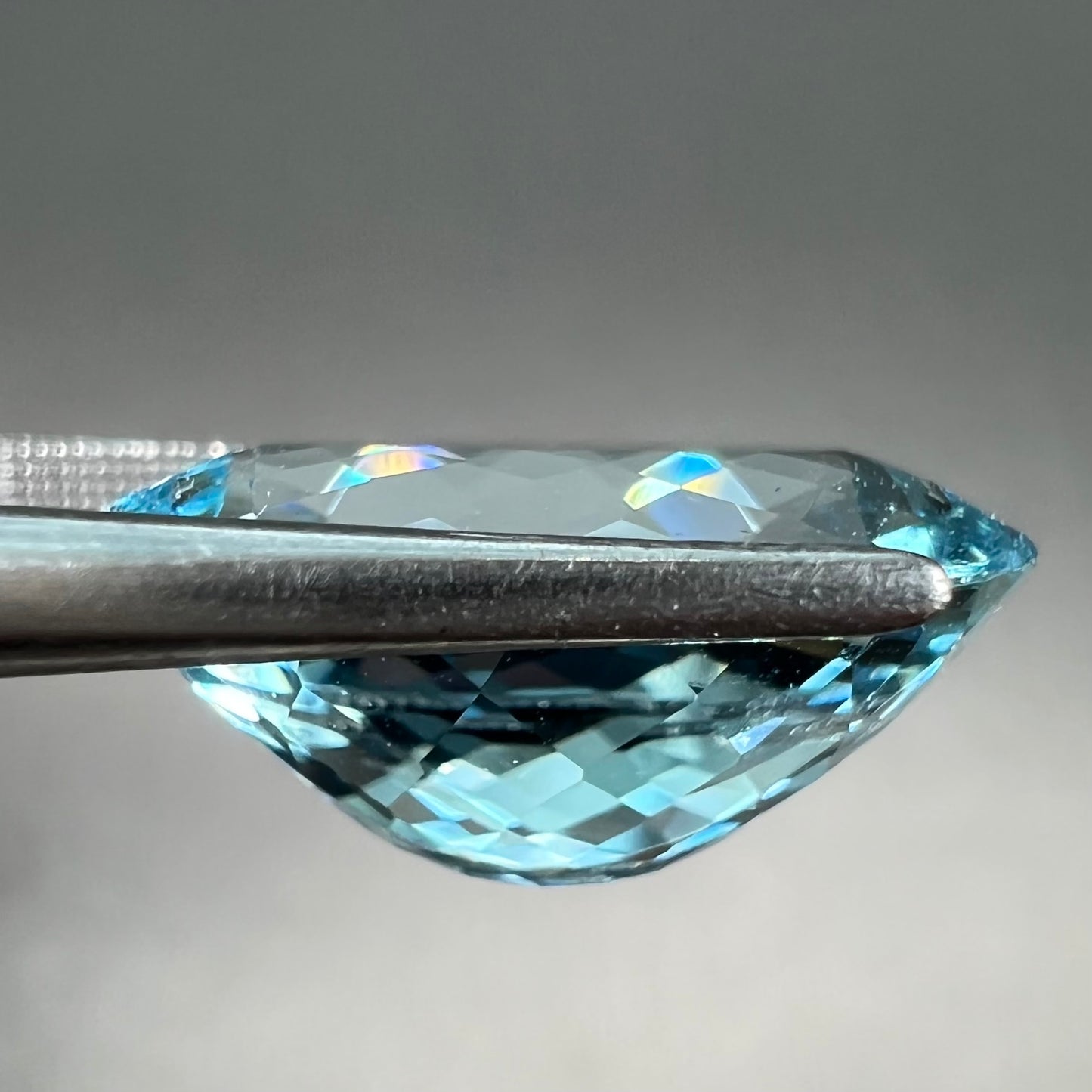 A loose, AAA grade, oval cut aquamarine stone from Brazil.