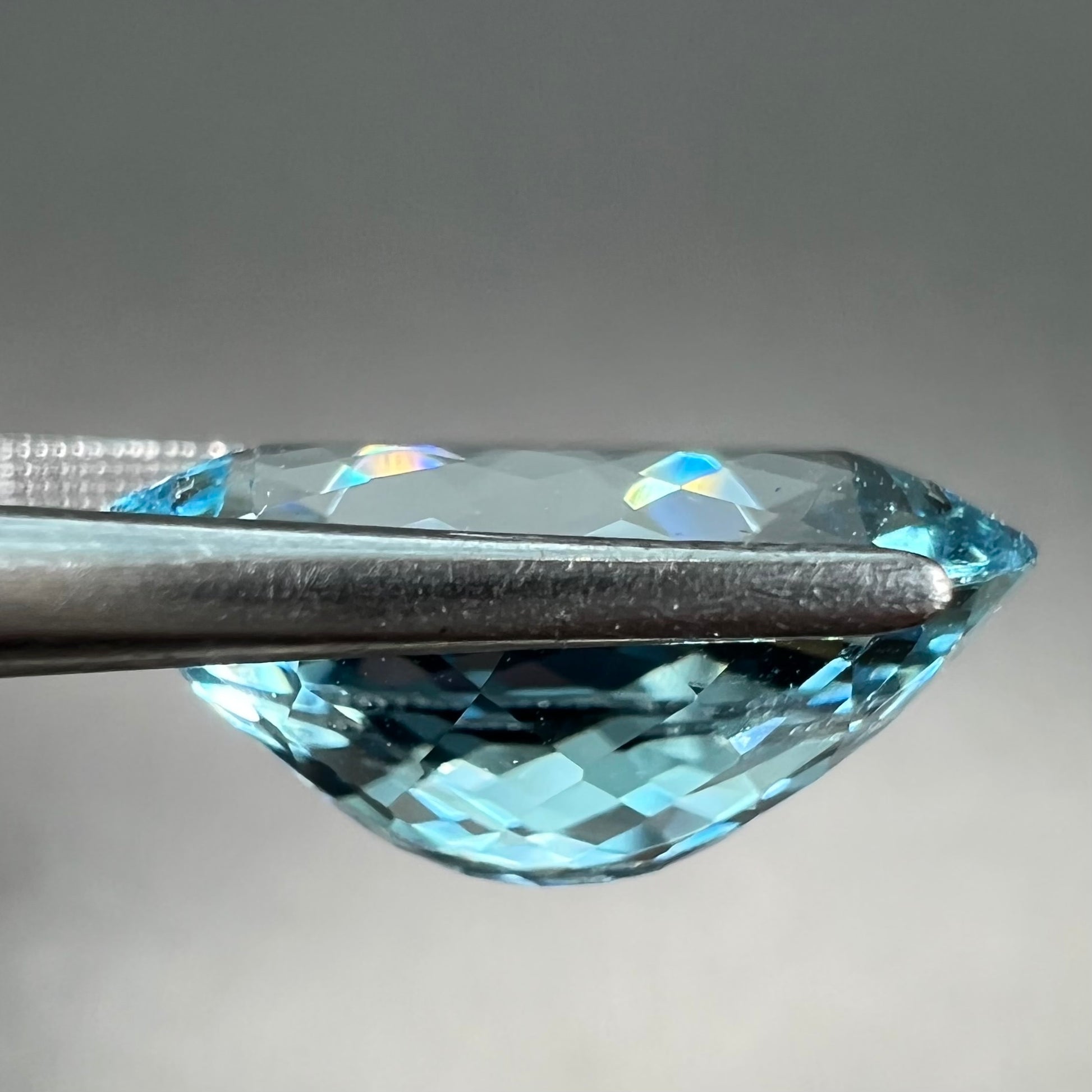 A loose, AAA grade, oval cut aquamarine stone from Brazil.