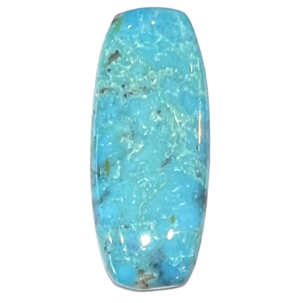 A loose, barrel shape, cabochon cut blue turquoise stone from Bisbee, Arizona.