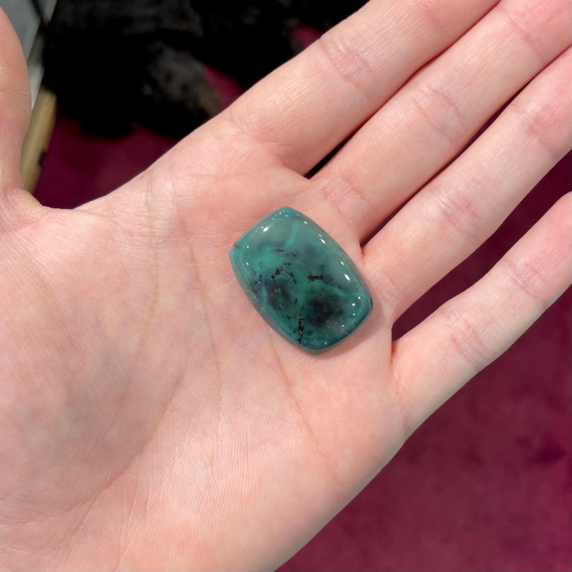 A loose, polished dark green turquoise stone from Royston Mining District, Nevada.