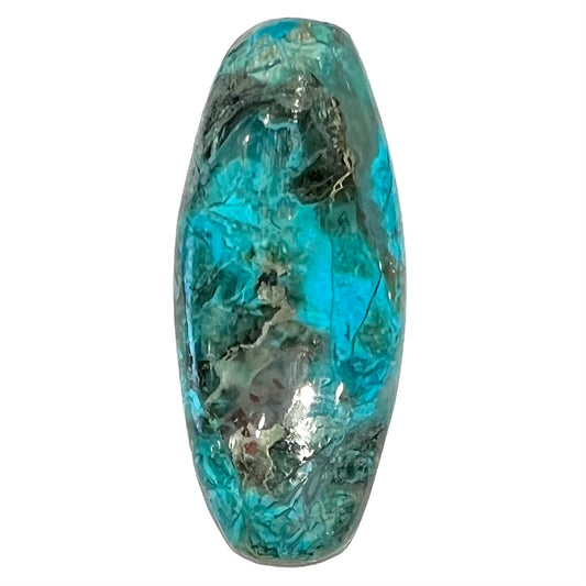 A barrel cabochon cut turquoise from Kingman, Arizona.