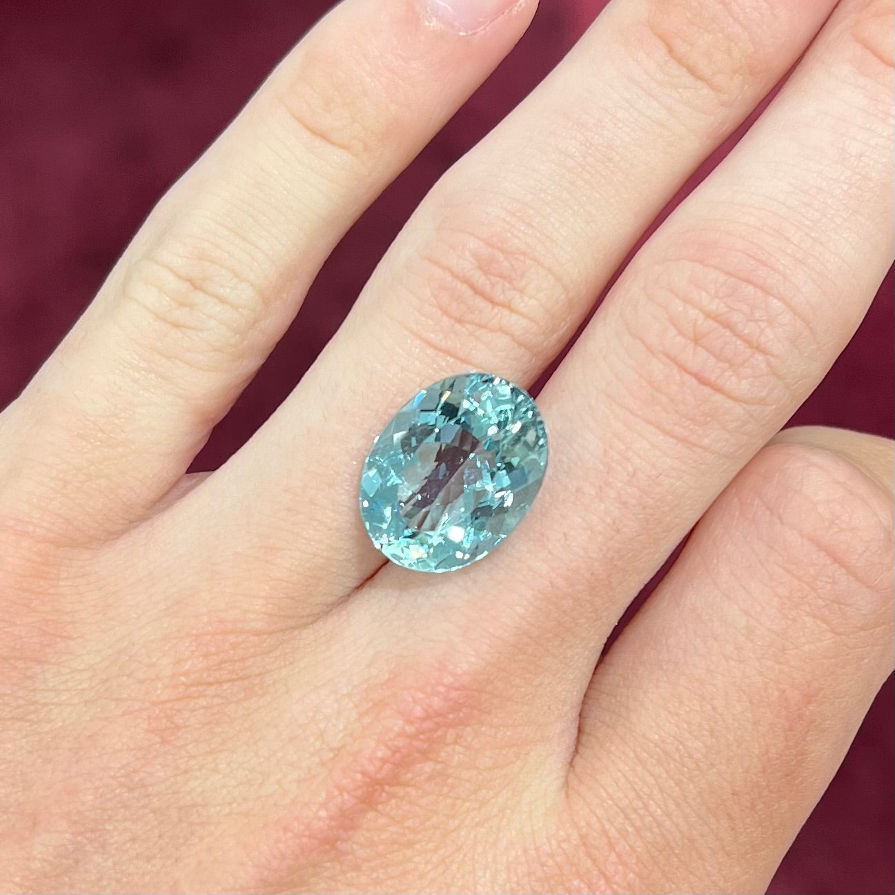 A loose, AAA grade, oval cut aquamarine stone from Brazil.