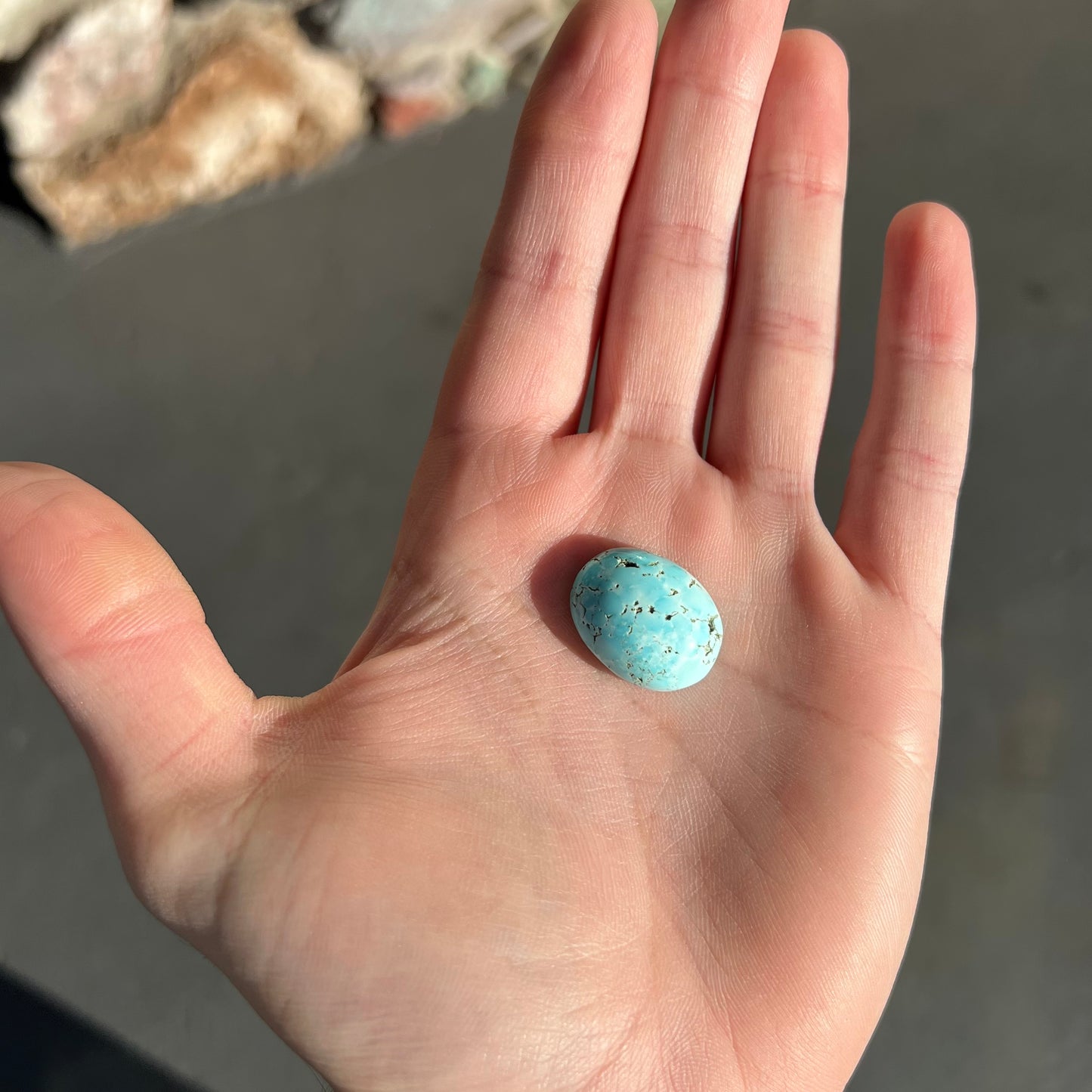A loose oval cut turquoise cabochon from the Sleeping Beauty Mine in Arizona.