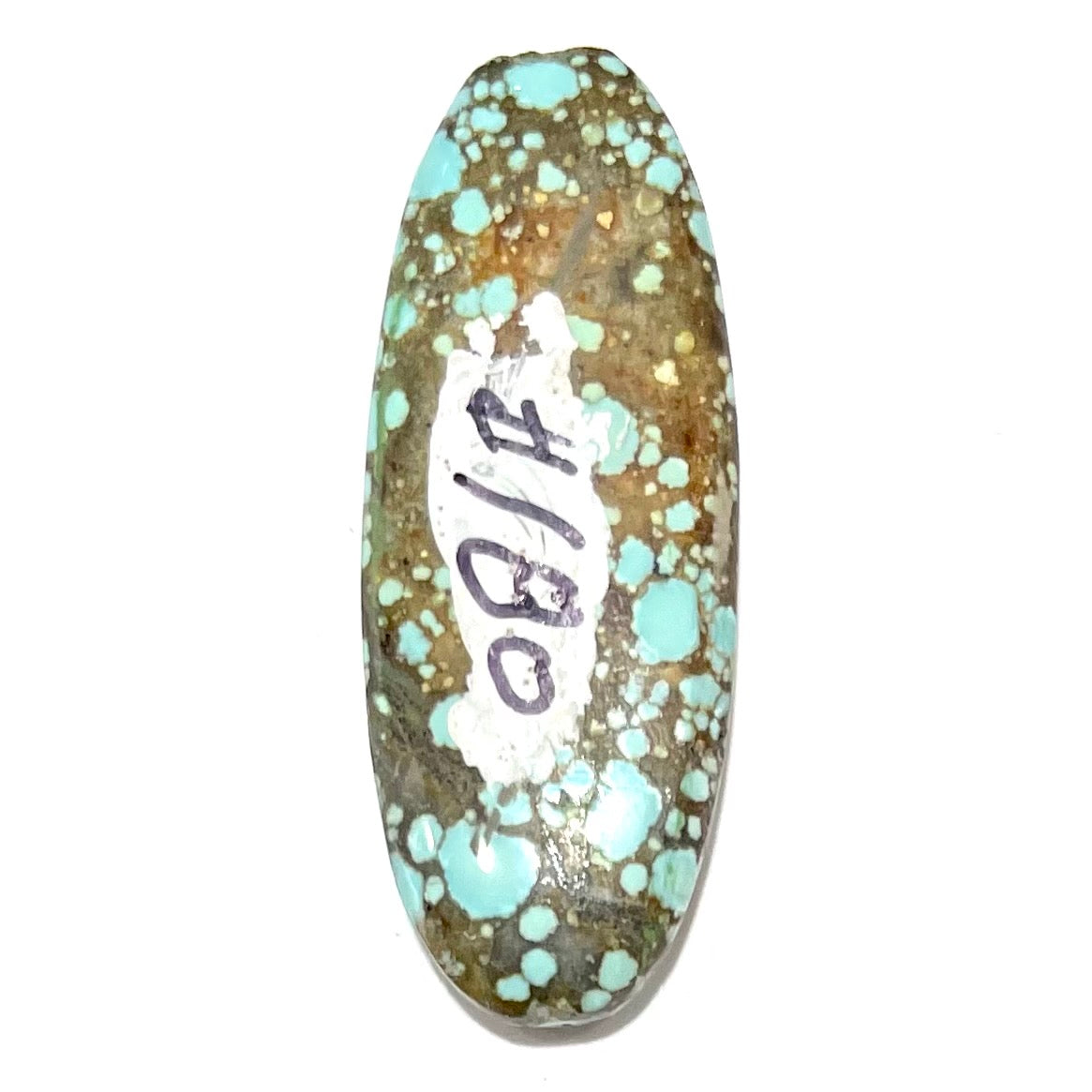 A loose, oval cabochon cut turquoise stone from the Number 8 Mine in Lander County, Nevada.