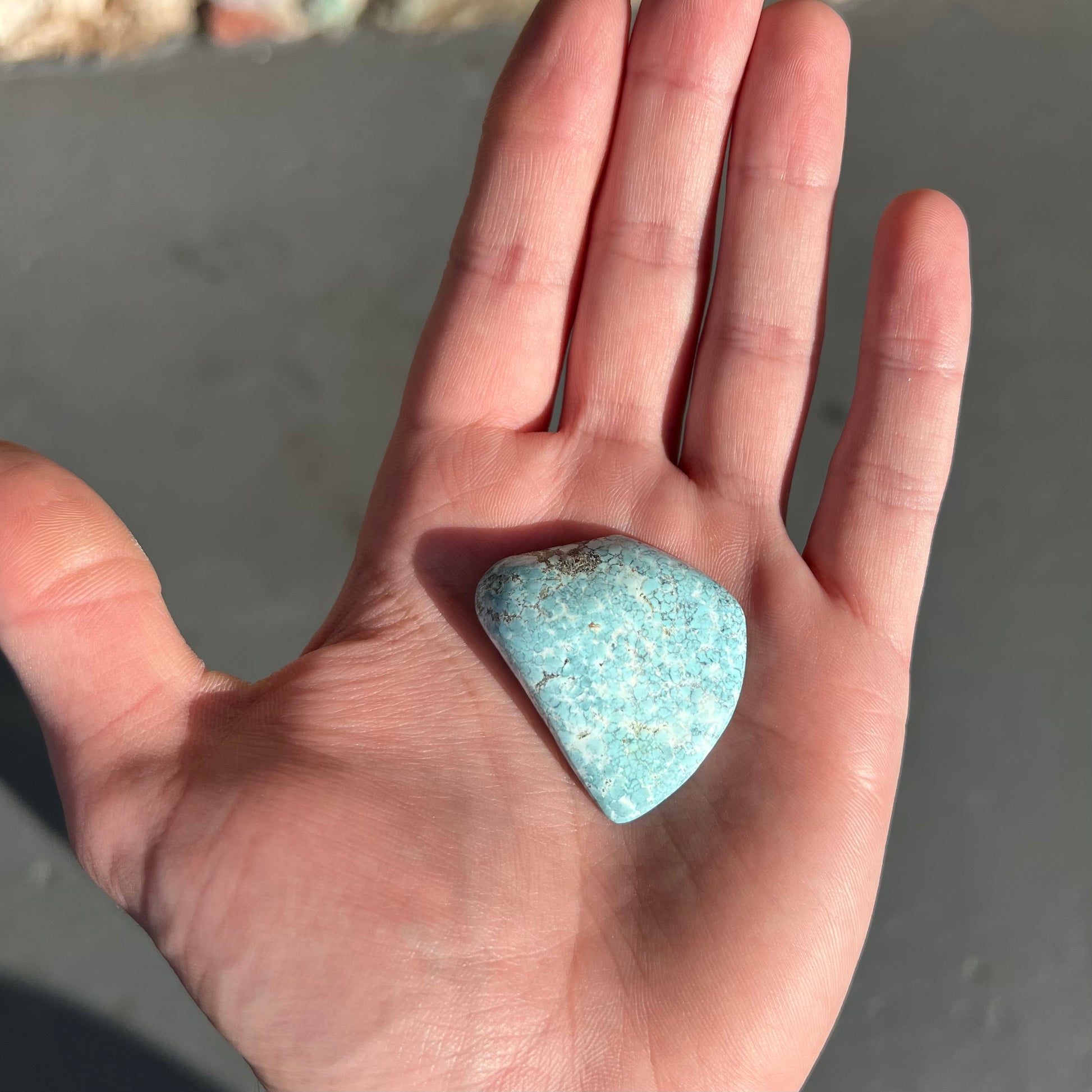 Loose light blue turquoise stone with gray matrix from Baja California, Mexico.