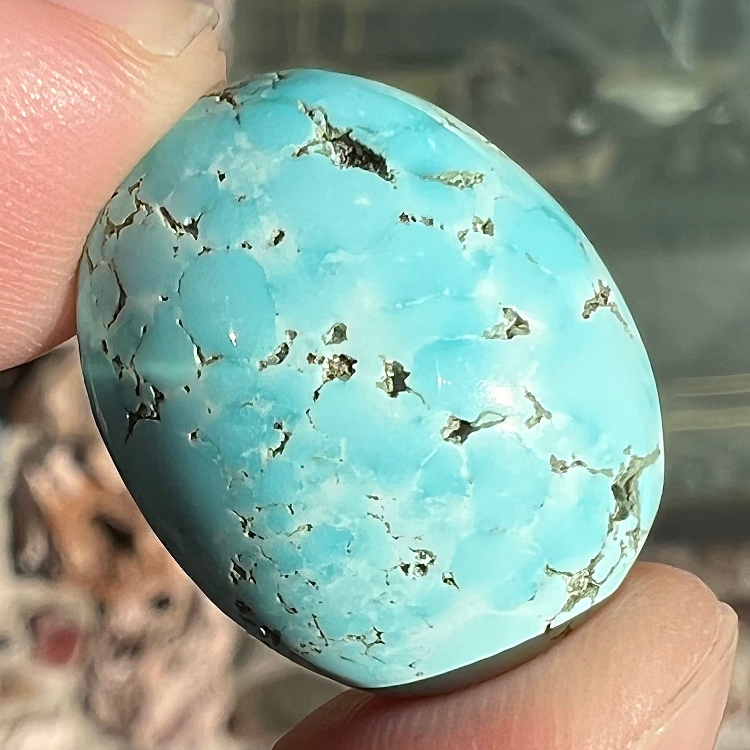 A loose oval cut turquoise cabochon from the Sleeping Beauty Mine in Arizona.