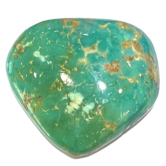 A loose polished greenish blue turquoise stone from Manassa, Colorado.