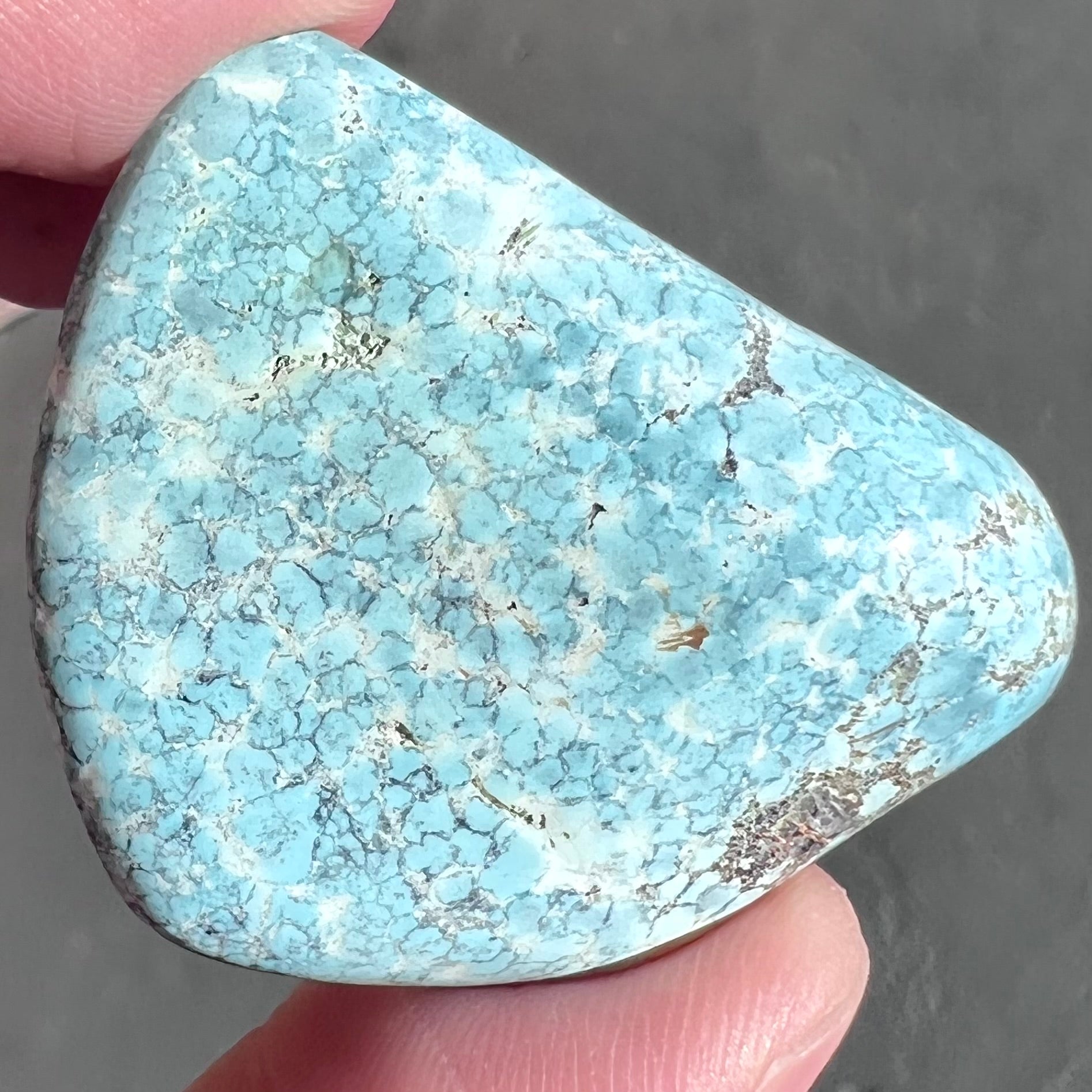 Loose light blue turquoise stone with gray matrix from Baja California, Mexico.