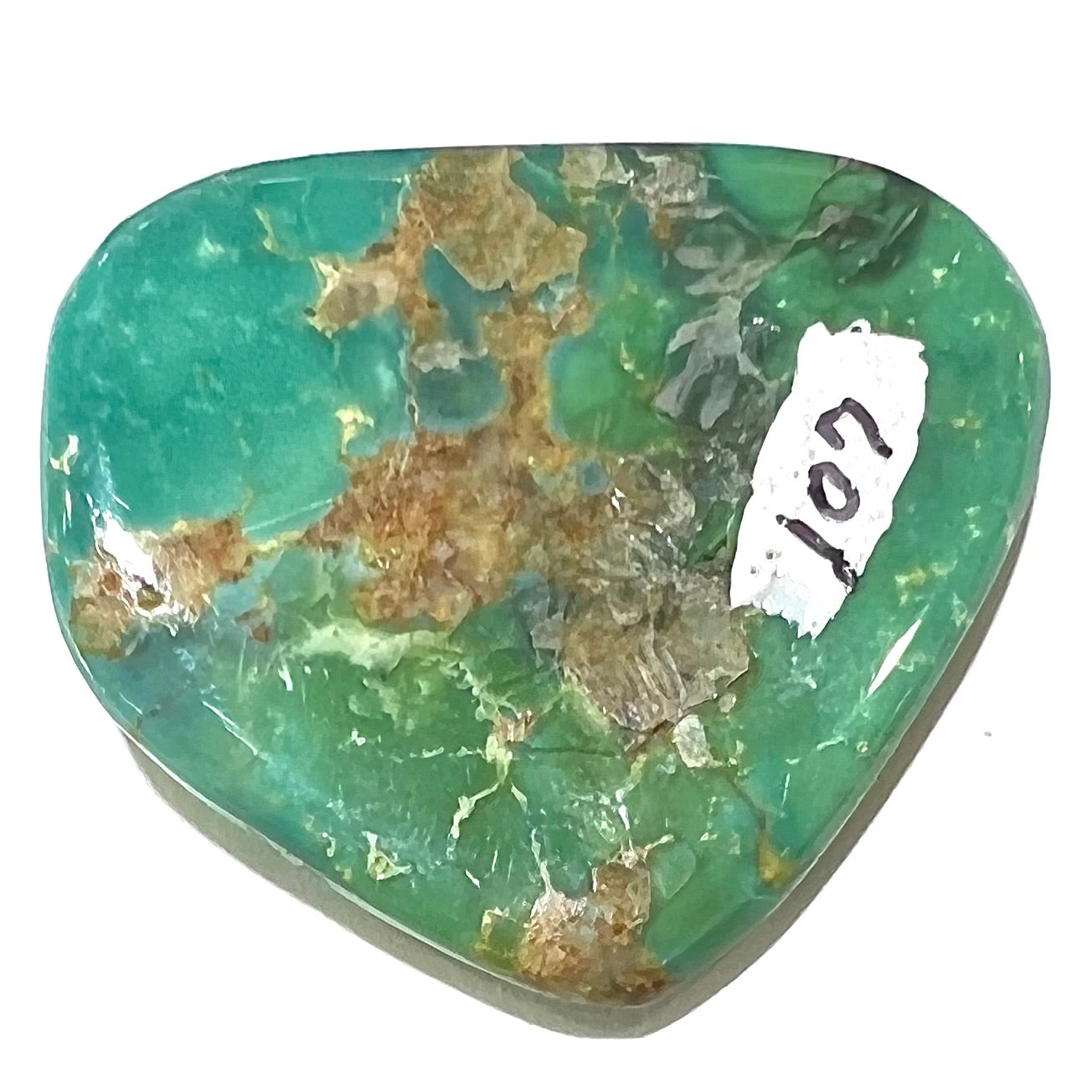 A loose polished greenish blue turquoise stone from Manassa, Colorado.