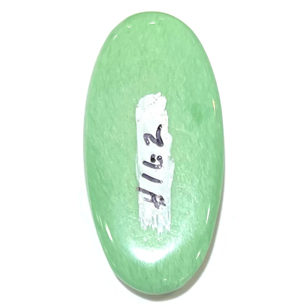 A loose, oval cabochon cut variscite stone from Utah, USA.