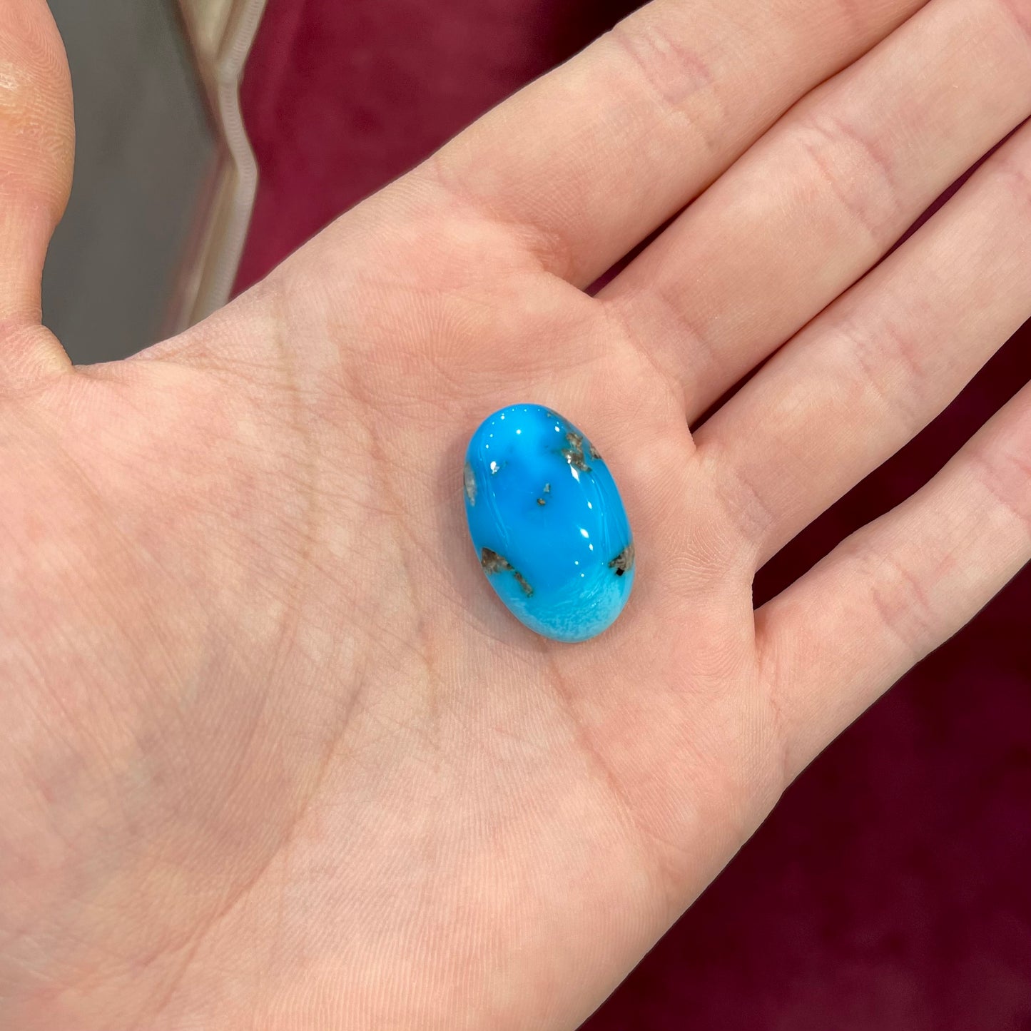 A bright blue Sleeping Beauty turquoise cabochon.
