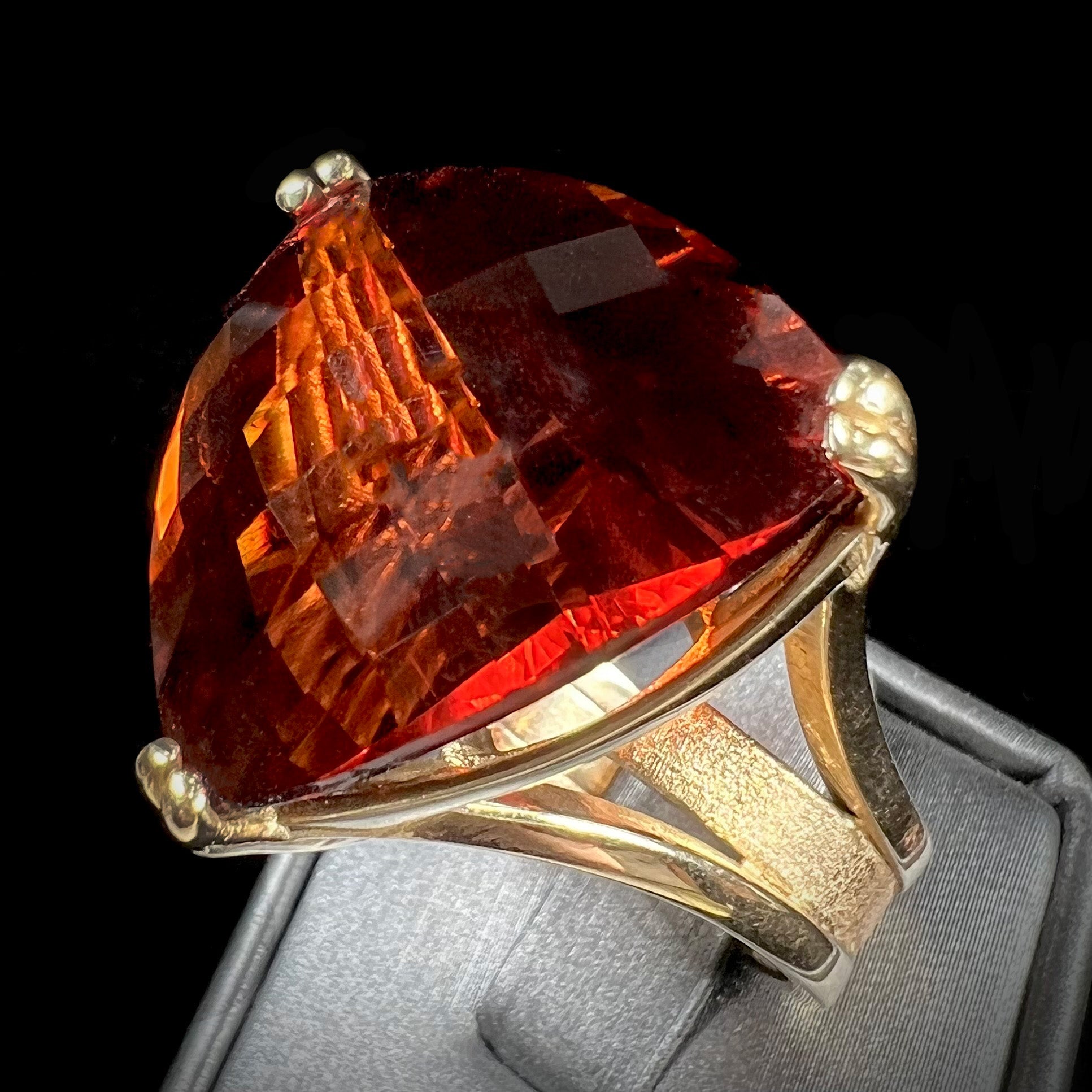 A ladies' trillion cut madeira citrine cocktail ring handmade in yellow gold.