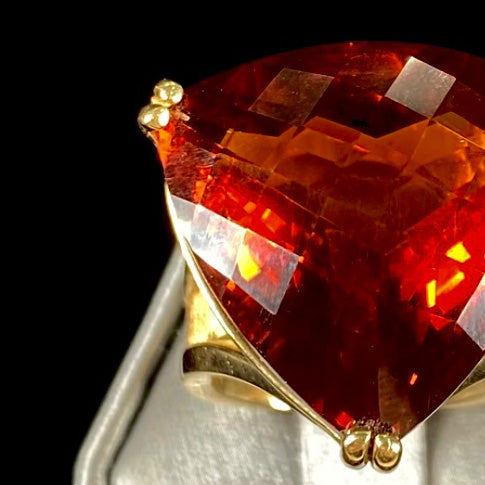 A ladies' trillion cut madeira citrine cocktail ring handmade in yellow gold.