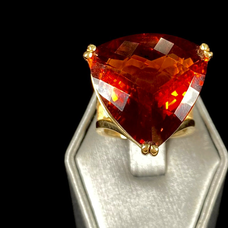 A ladies' trillion cut madeira citrine cocktail ring handmade in yellow gold.