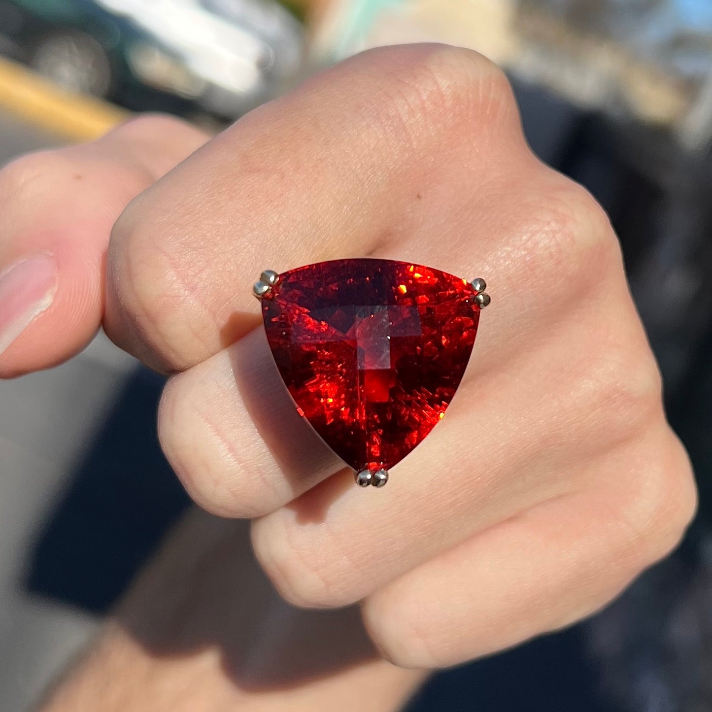 A ladies' trillion cut madeira citrine cocktail ring handmade in yellow gold.