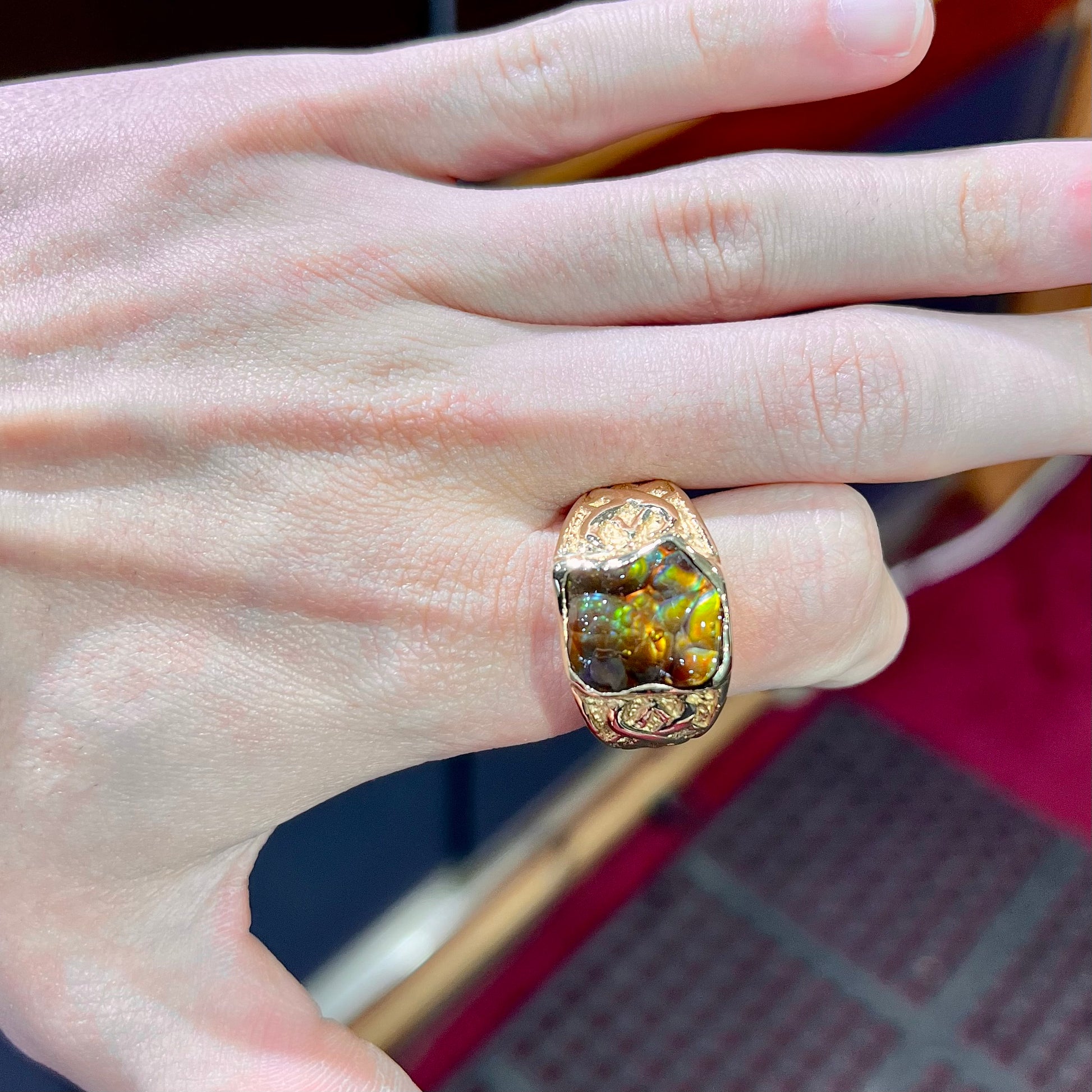 Custom, heavy yellow gold men's ring set with fire agate from Deer Creek, Arizona.