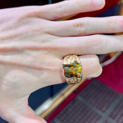 Custom, heavy yellow gold men's ring set with fire agate from Deer Creek, Arizona.