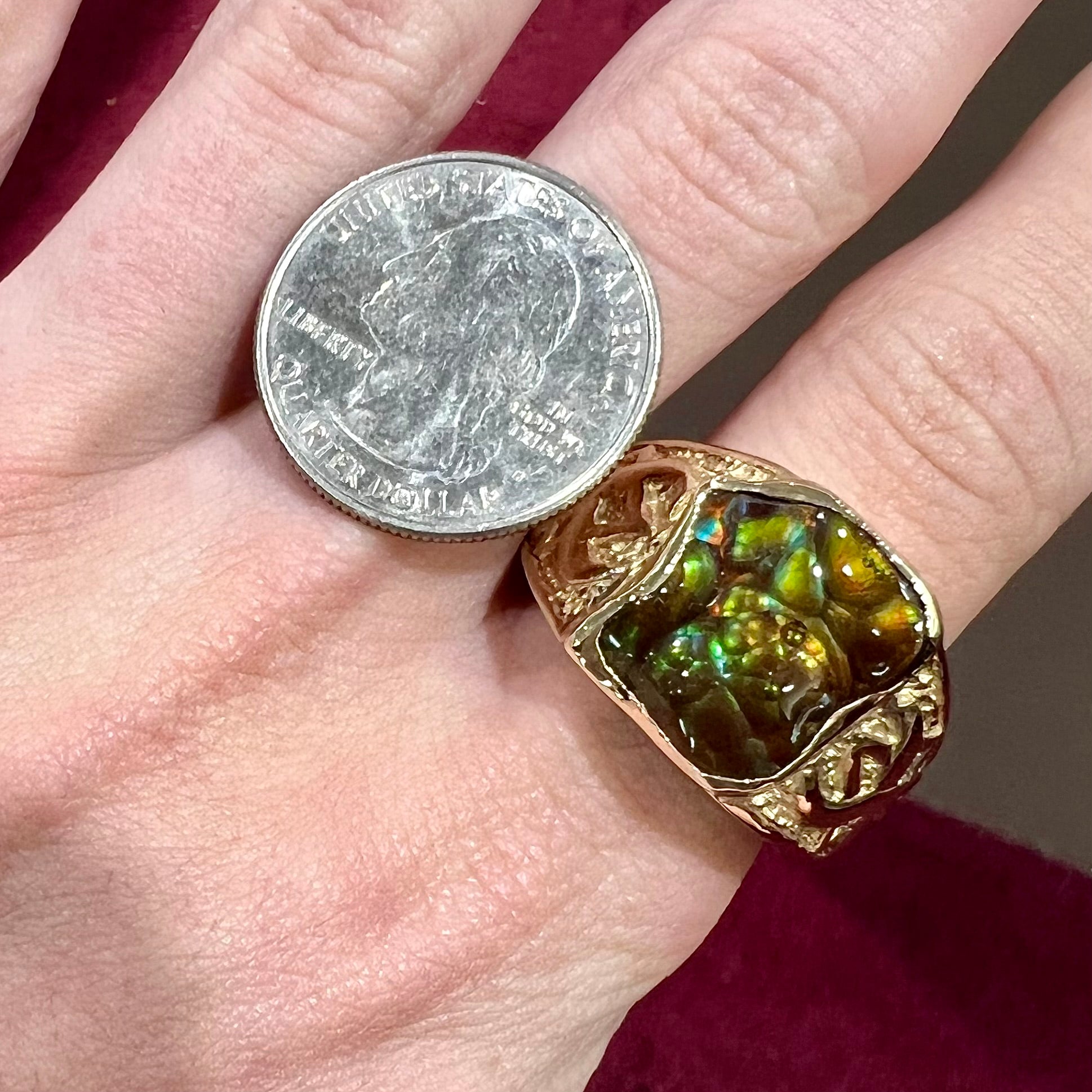 Custom, heavy yellow gold men's ring set with fire agate from Deer Creek, Arizona.