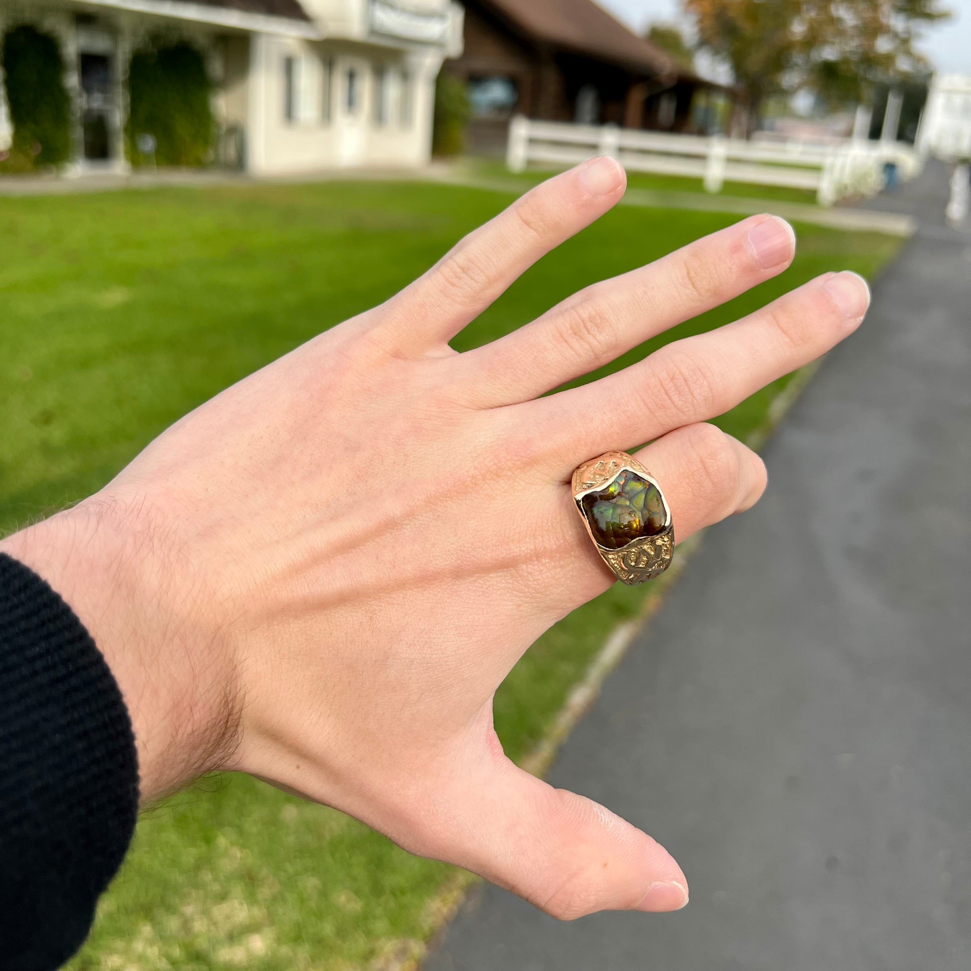 Custom, heavy yellow gold men's ring set with fire agate from Deer Creek, Arizona.