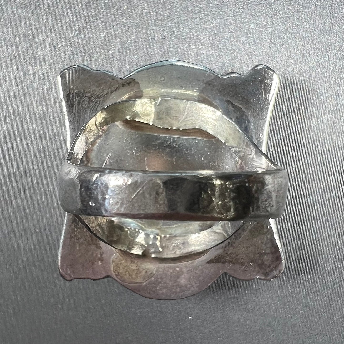 A sterling silver ring set with Tyrone turquoise from Burro Mountains, New Mexico.
