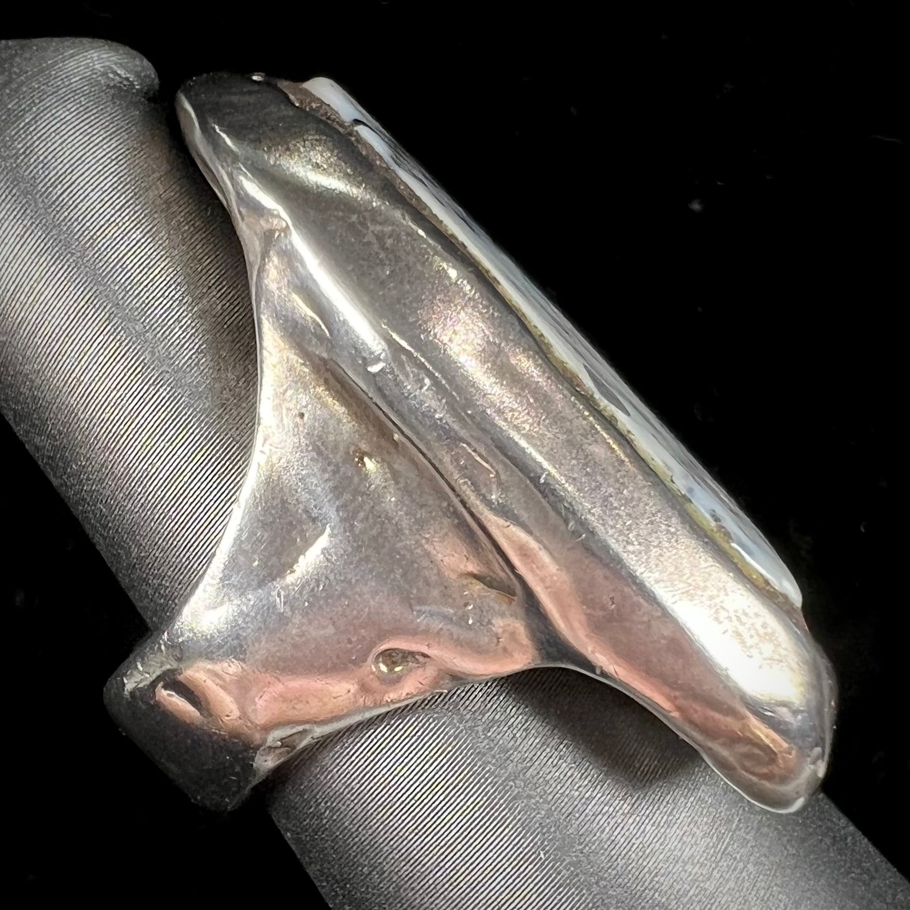 A bezel set ring handmade in sterling silver with a white dendritic agate stone.