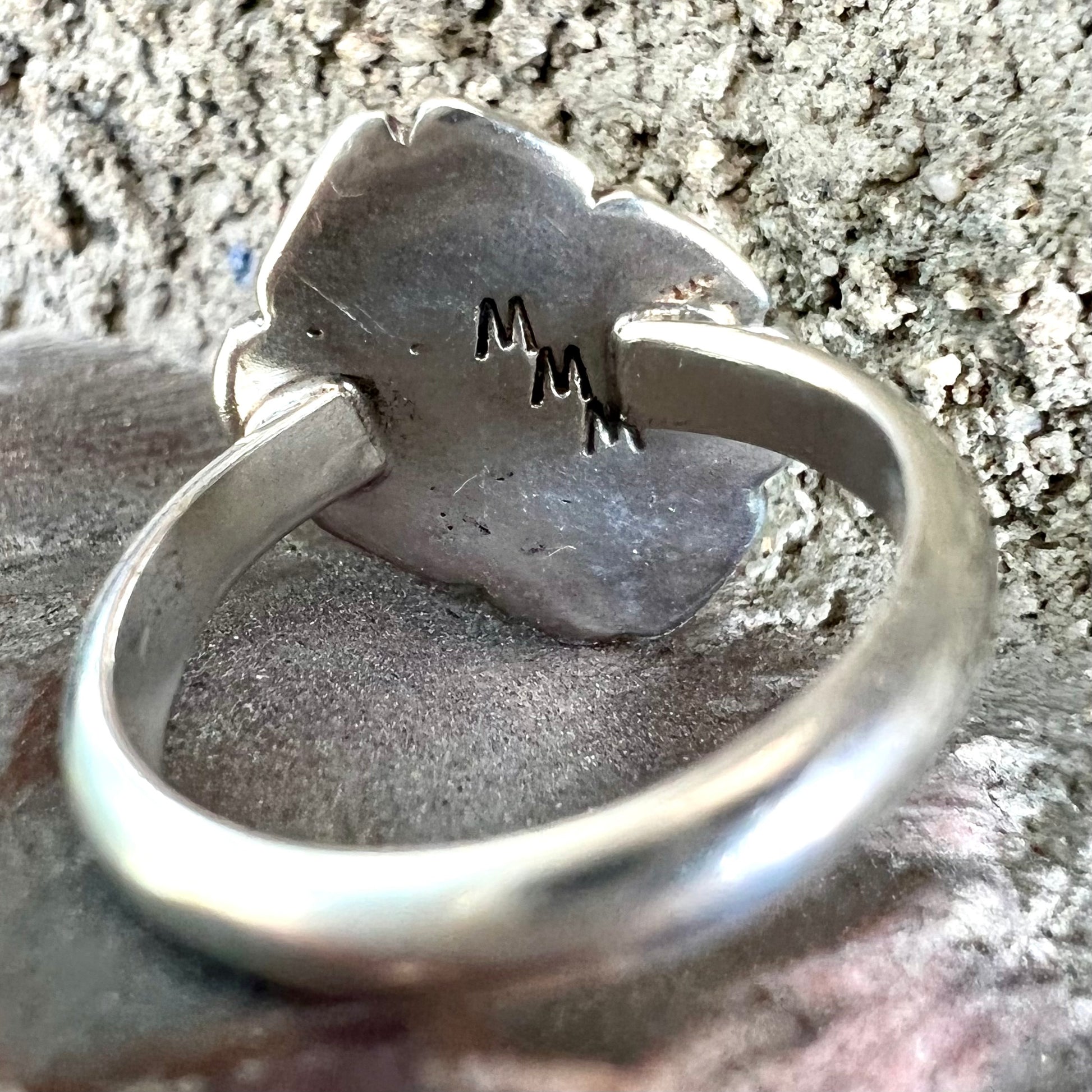 A handmade, sterling silver Native American turquoise nugget ring.