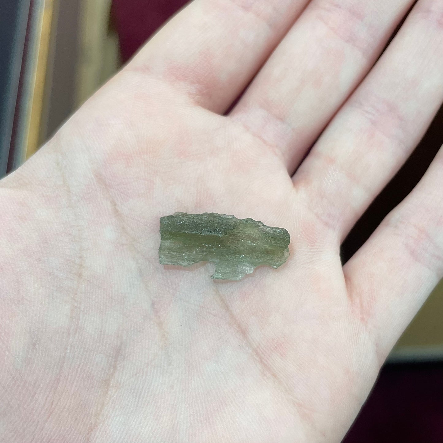 A natural moldavite glass crystal.
