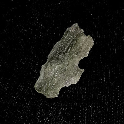 A natural moldavite glass crystal.