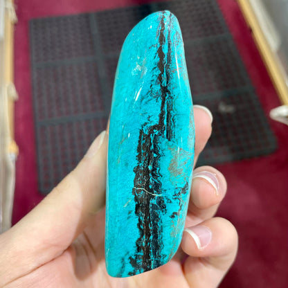 An exceptionally large, freeform shaped, polished turquoise specimen from Morenci, Arizona.