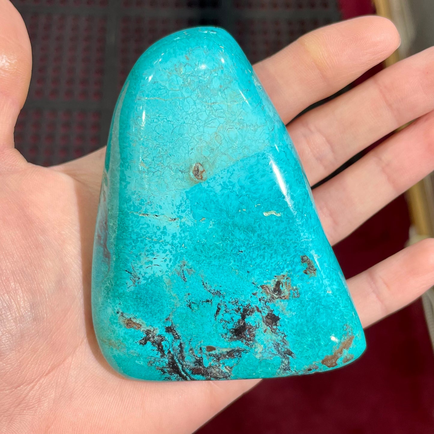 An exceptionally large, freeform shaped, polished turquoise specimen from Morenci, Arizona.